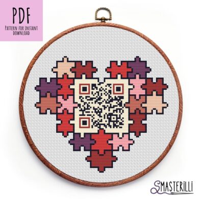 Picture of a modern cross stitch pattern with a heart and QR code, and love words