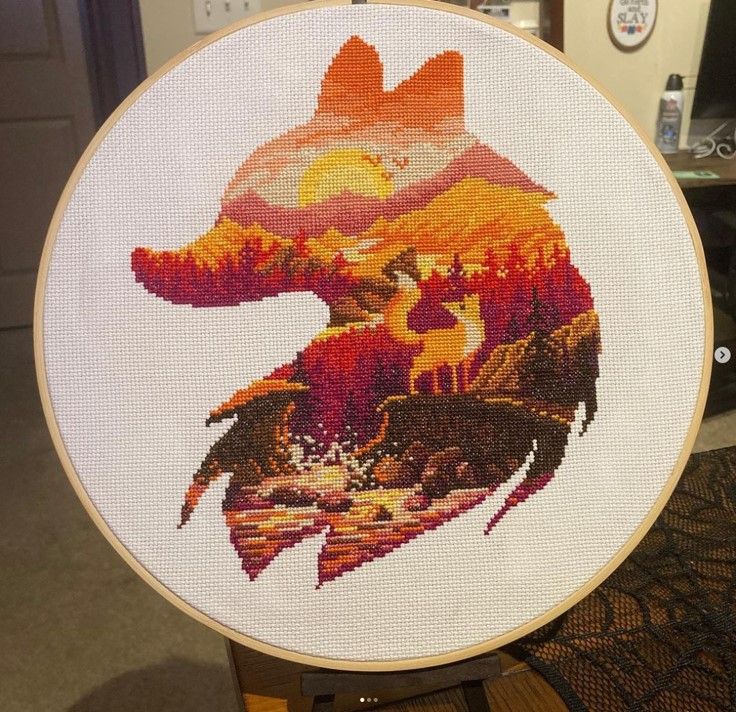 Red fox silhouette with landscape cross stitch ornament