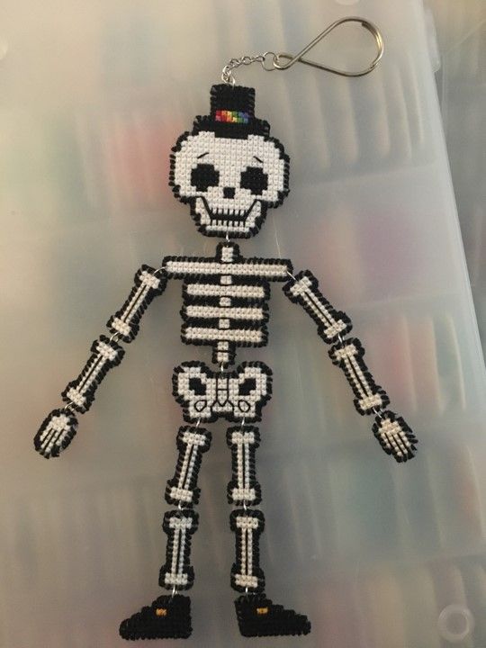 Skeleton cross stitch doll on plastic canvas